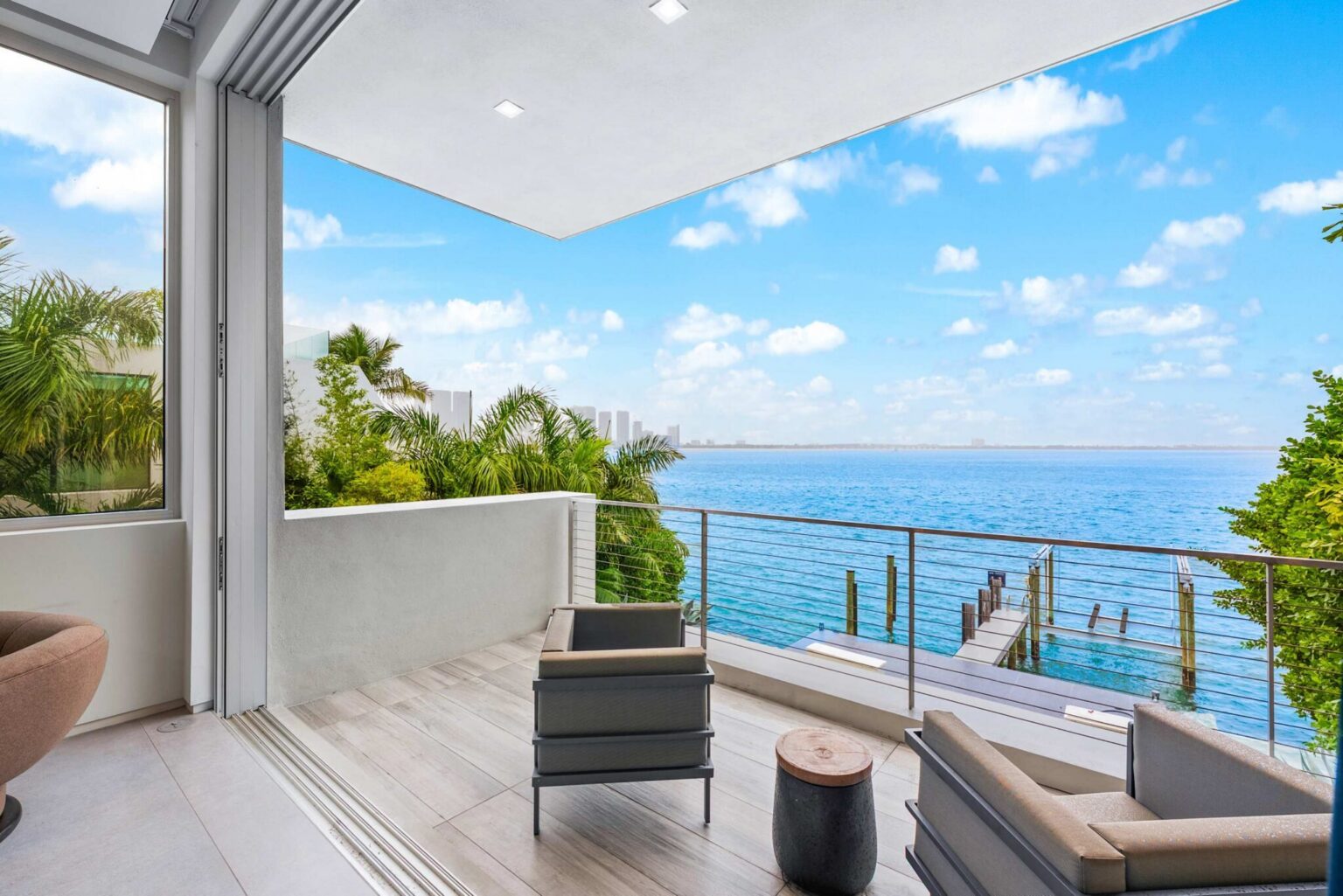 Take in breathtaking bayfront views from your private waterfront terrace, where endless blue horizons create a true resort-style escape.
