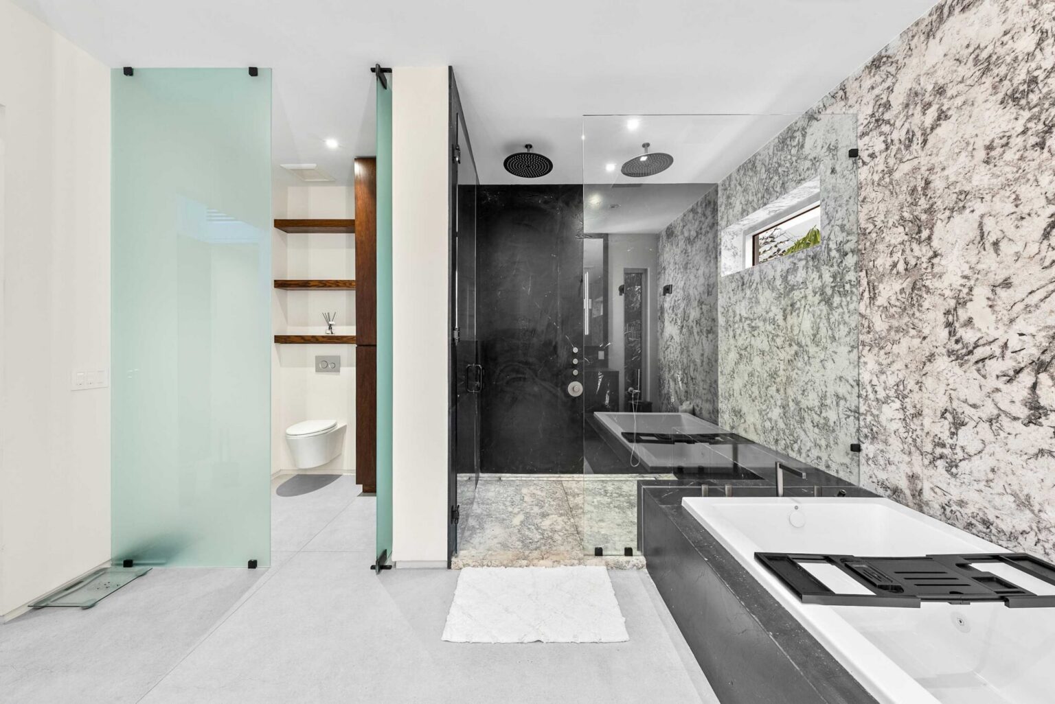Enjoy the luxury of a private spa suite, complete with a soaking tub, rainfall shower, and resort-inspired design.