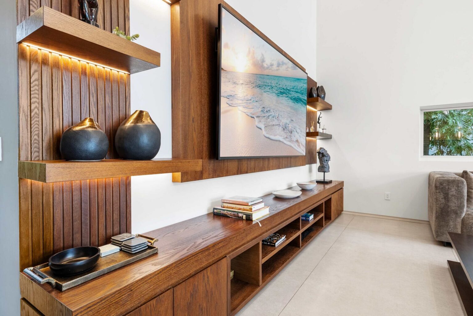 Showcasing impeccable craftsmanship and contemporary design, this elegant living space features bespoke millwork, ambient lighting, and premium finishes that embody modern luxury.