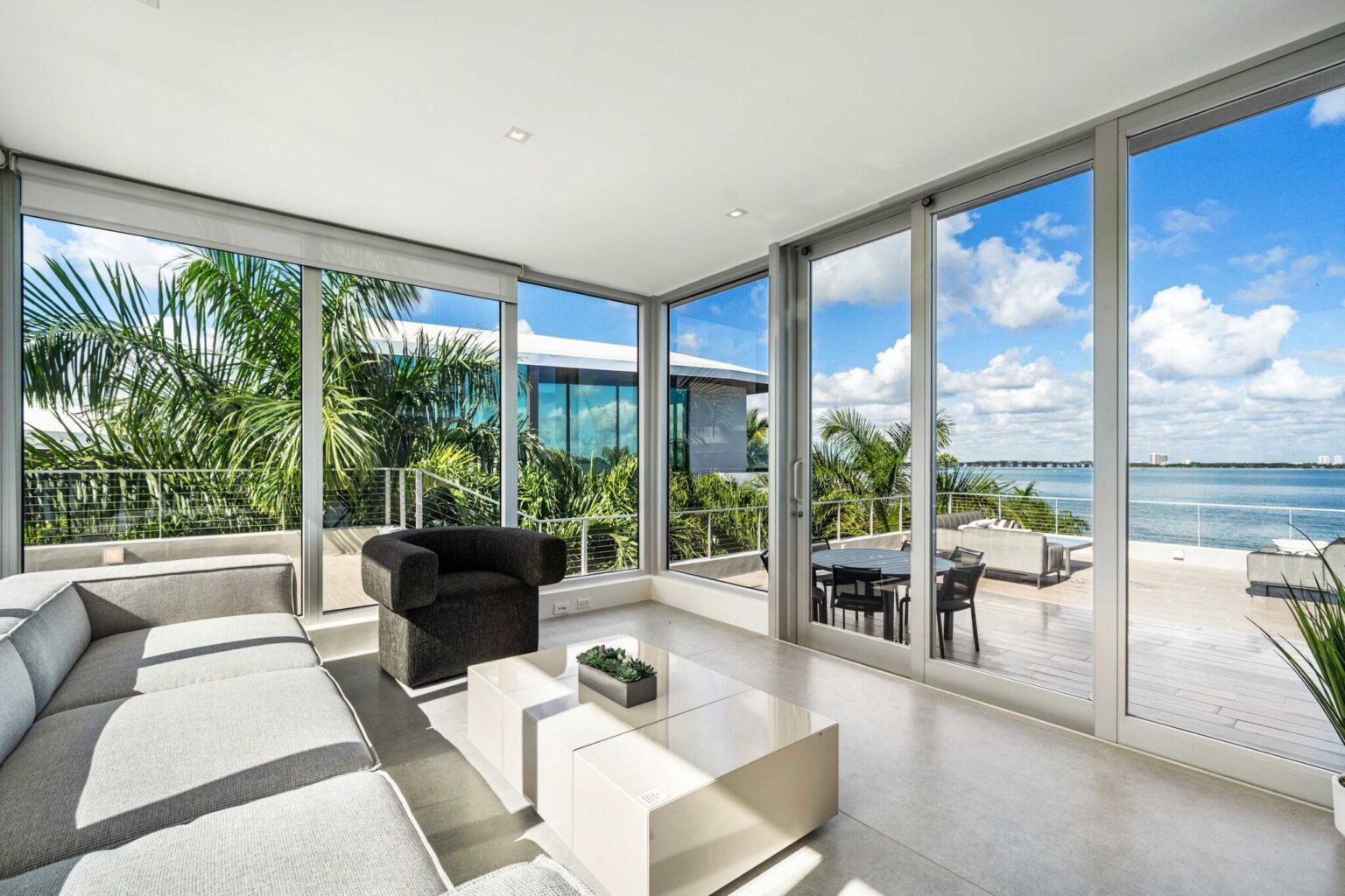 Luxury waterfront living at its finest, featuring panoramic views and abundant natural light.