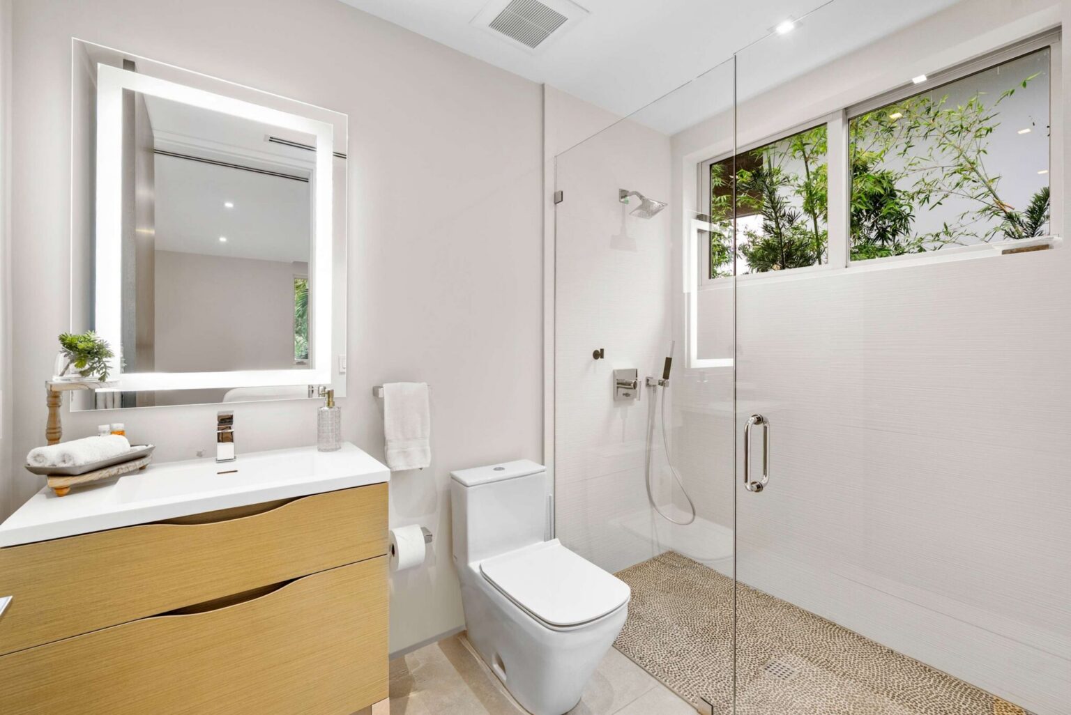 Refresh and recharge in a spa-inspired en-suite designed with premium finishes and a luxurious walk-in shower.
