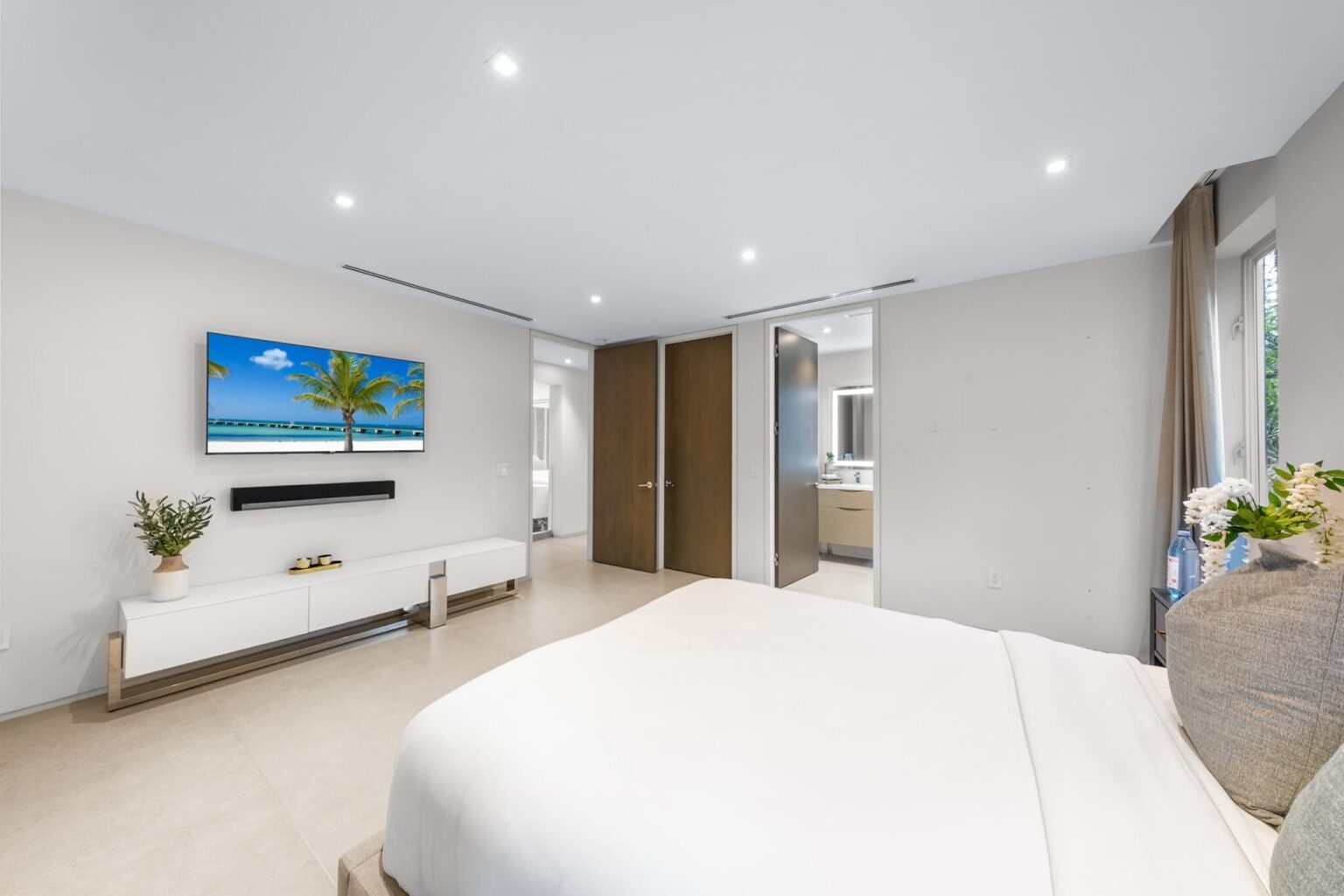 An inviting sanctuary where contemporary design, premium bedding, and thoughtful details create a restful escape.