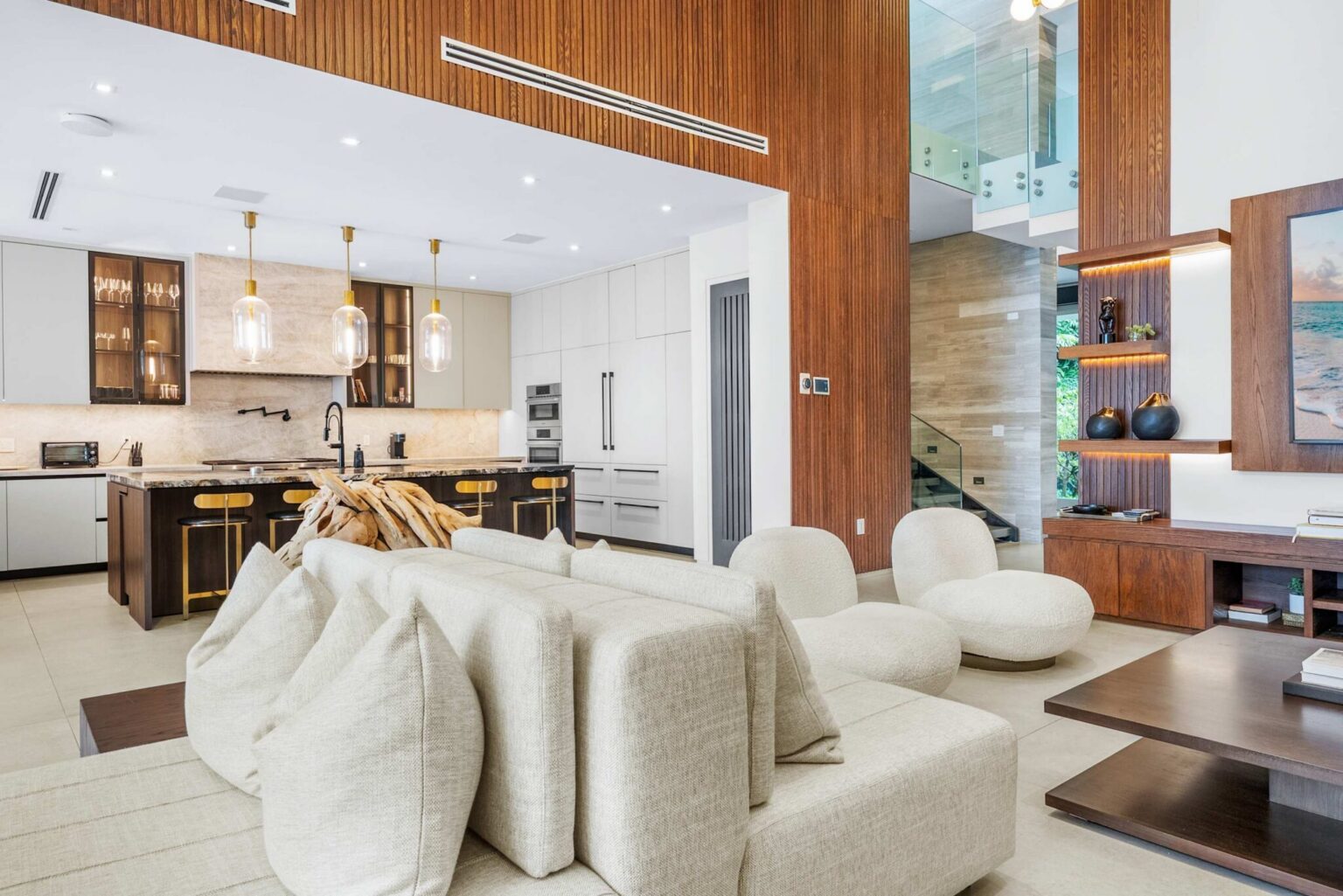 A breathtaking designer residence featuring a chef’s kitchen, soaring ceilings, and bespoke architectural details throughout.