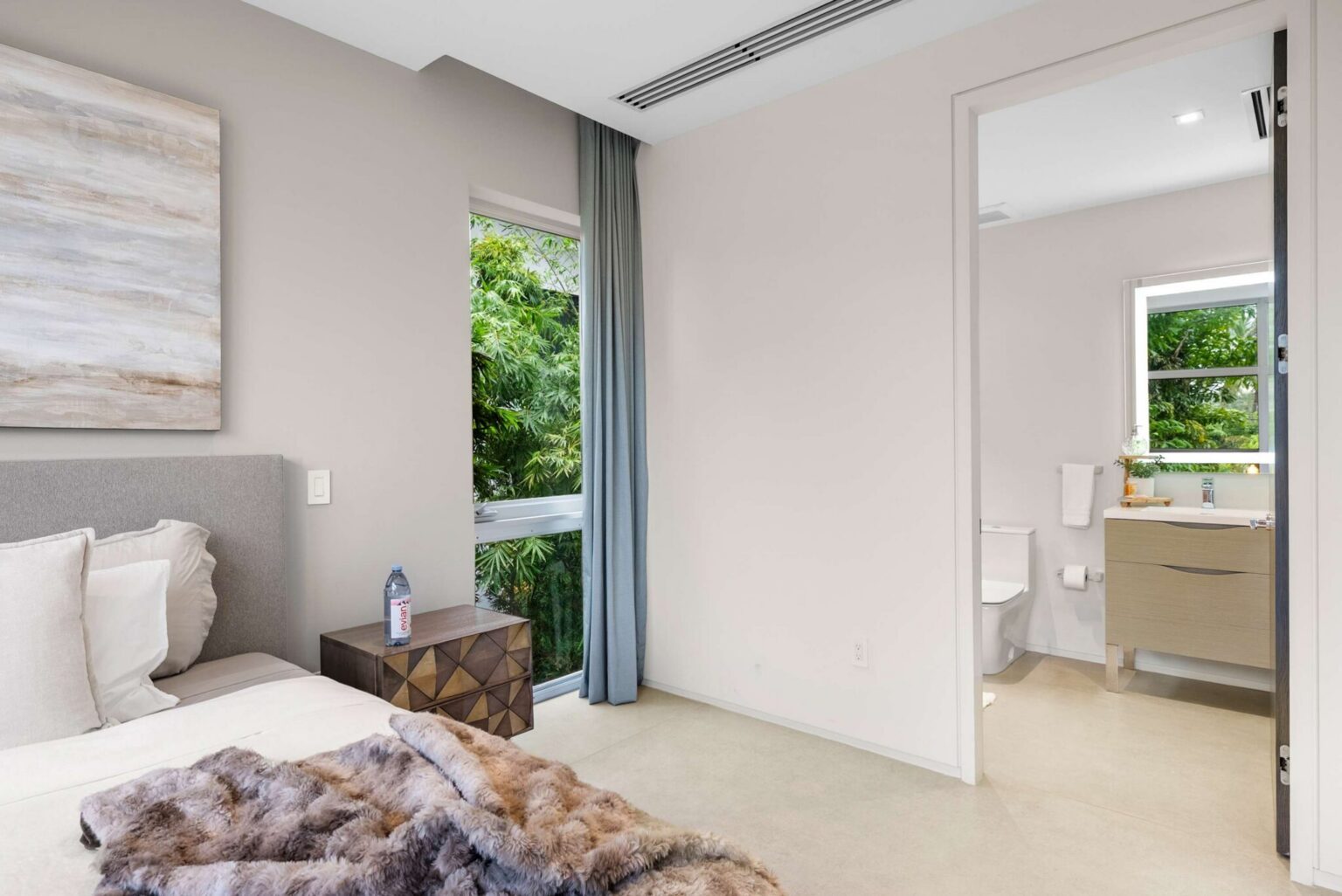 Thoughtfully designed for relaxation, this elegant suite blends contemporary luxury with tranquil natural surroundings.