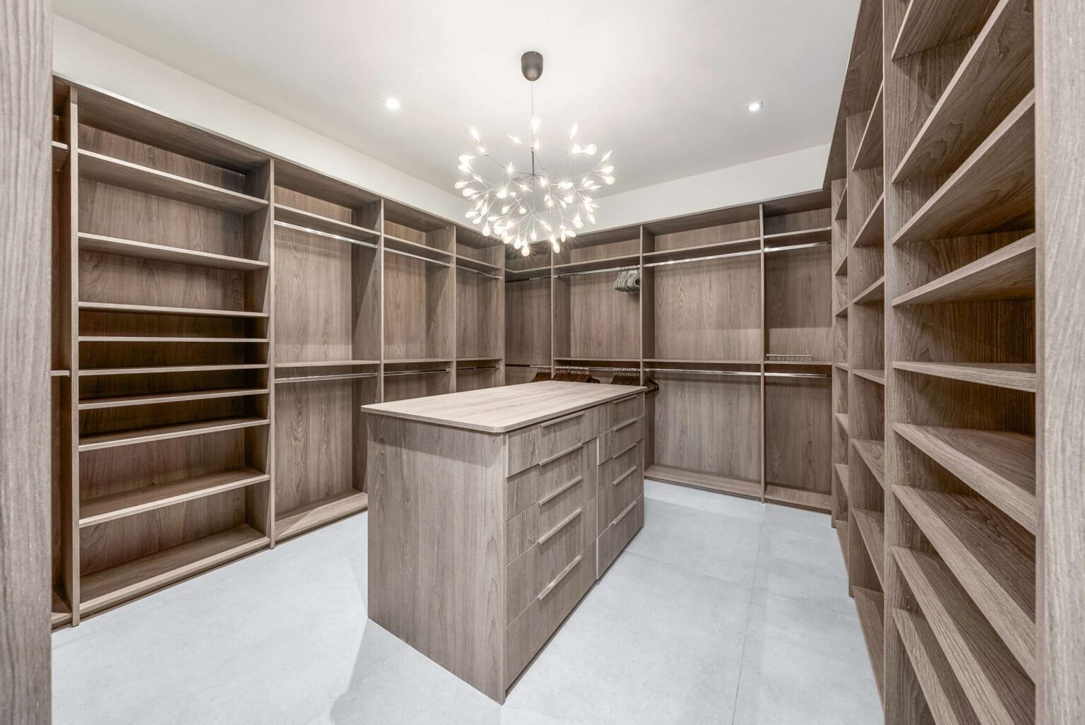 Elevate your stay with a luxurious wardrobe suite designed for effortless organization and sophisticated living.