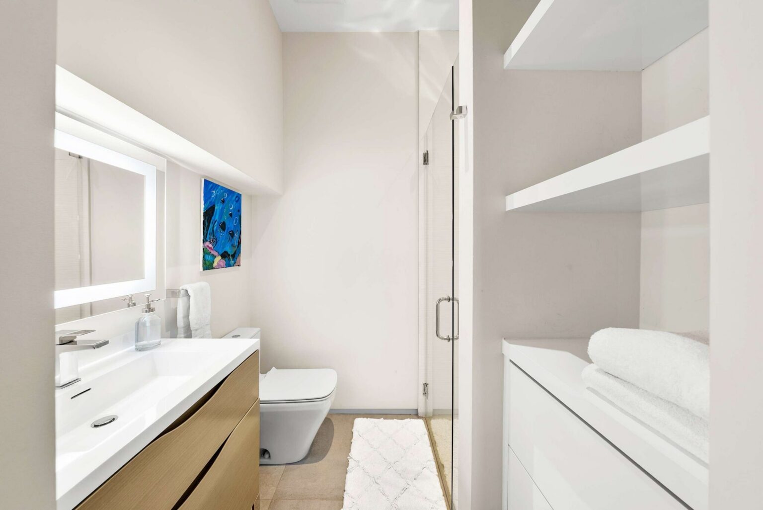 A private sanctuary designed for comfort and convenience, featuring custom built-ins and contemporary finishes.