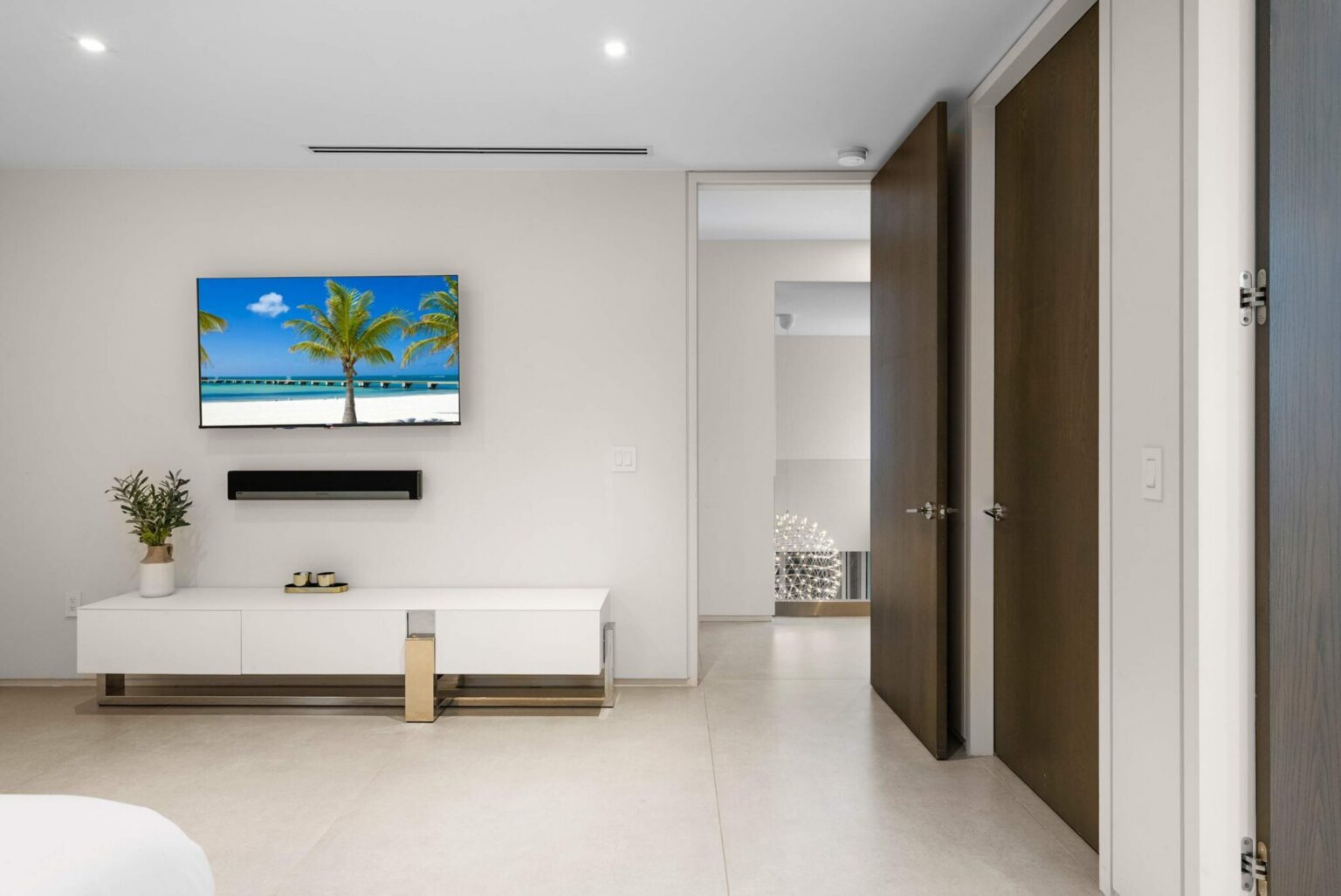 A refined guest retreat featuring clean contemporary design, premium finishes, and a tranquil en-suite sanctuary.