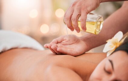 Luxury in-villa massage therapy with aromatic massage oil for a relaxing private spa experience