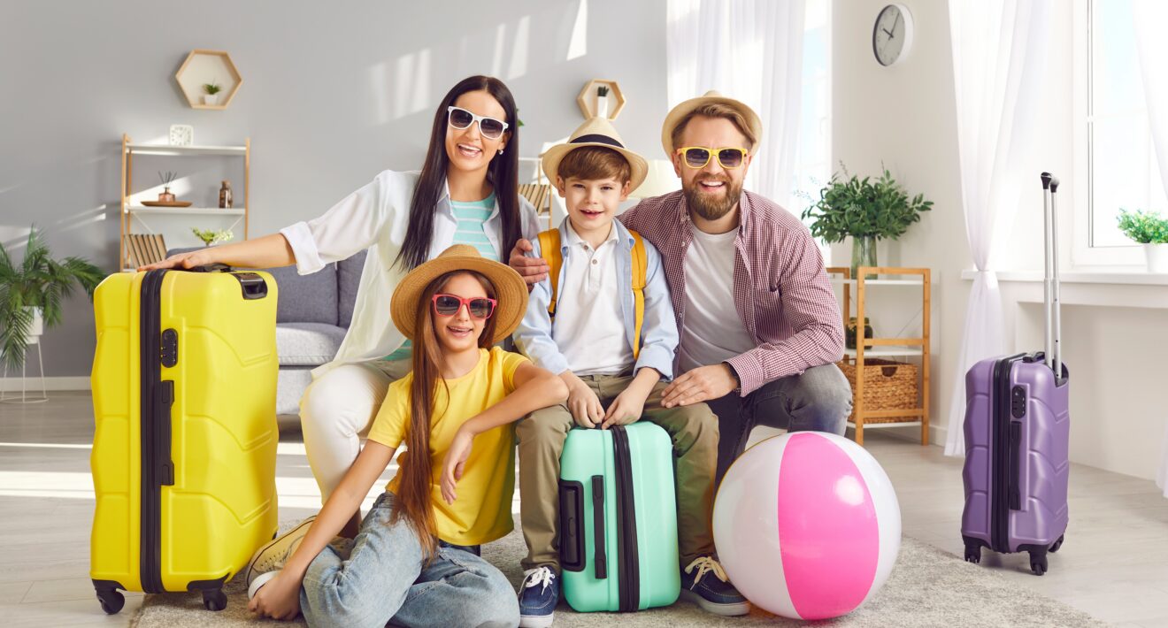 Family arriving at a luxury Miami vacation rental with luggage, ready for a villa getaway.